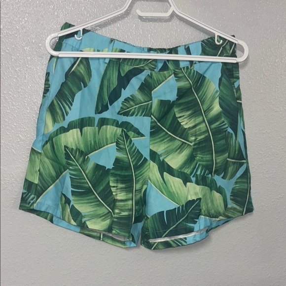 Green and Blue Athletic Shorts with Tropical Leaf Design - Picture 3 of 13